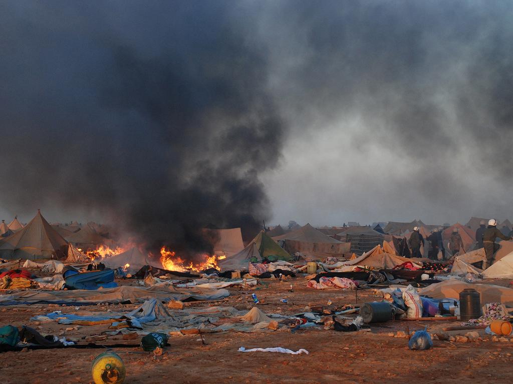 Moroccan forces dismantling a refugee camp in Western Sahara in 2010. Picture: MAP