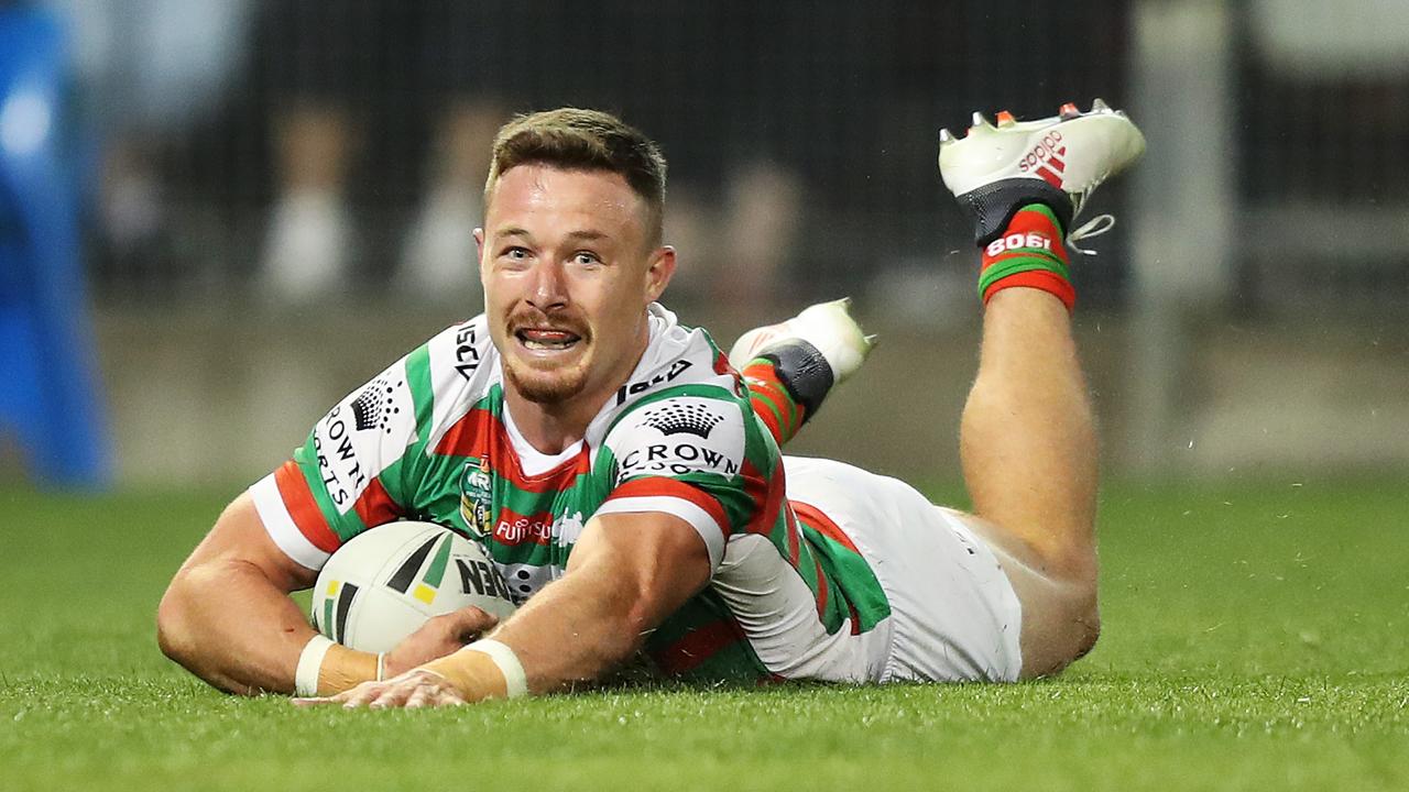 Damien Cook slides in for a try for the Rabbitohs.