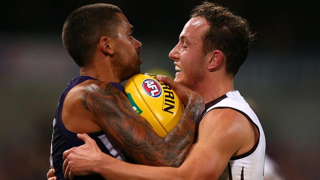 Bradley Hill runs into a Billy Hartung tackle. Picture: Getty Images