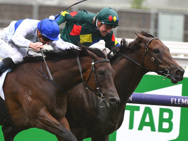 Jockey Ryan Maloney rides Alligator Blood to victory from Jockey James McDonald riding Catalyst in race 5, the Cs Hayes Stakes, during Black Caviar the Great Horse Race Day at Flemington Racecourse in Melbourne, Saturday, February 15, 2020. (AAP Image/Vince Caligiuri) NO ARCHIVING, EDITORIAL USE ONLY