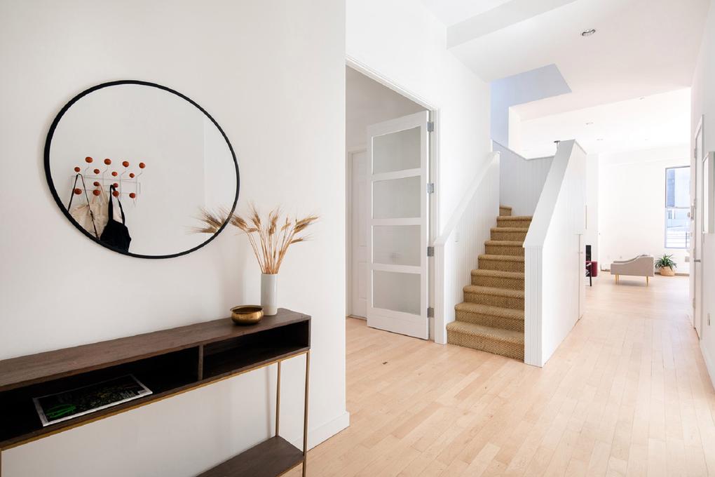 The hallway and staircase up to the second level. Picture: Realtor