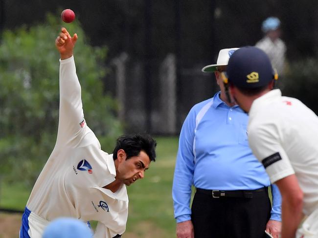 Raza Rizwan bowls during the VSDCA: Kew v Ivanhoe in Kew,  Saturday, Nov. 25, 2017. (Picture/Andy Brownbill)