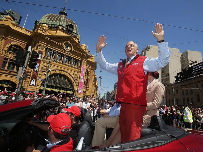 Christoph Berglar, owner of Protectionist, waves to the crowd during the 2014 Melbourne Cup Parade.