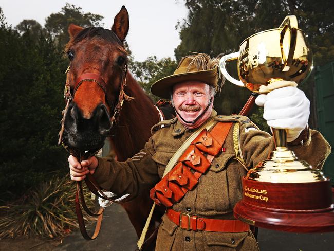 Troop Sergeant from the Tasmania Light Horse Regiment Nevill Thomas with horse Bella and the Melbourne Cup at the Lenah Valley RSL in Tasmania. Picture: Zak Simmonds