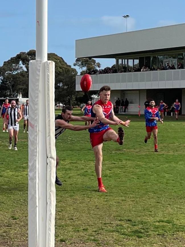 Haren boots his seventh goal for the day and 100th for the season. Picture: Lockleys Football Club