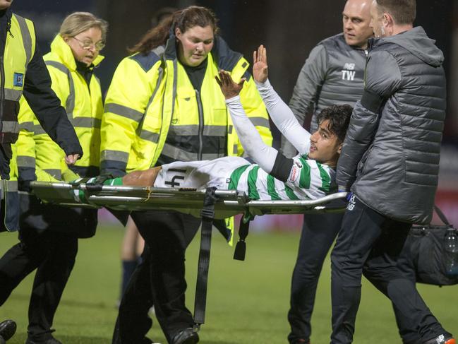CelticÕs Daniel Arzani goes off injured during the Scottish Premiership match at Dens Park, Dundee.. Picture date: Wednesday October 31, 2018. See PA story SOCCER Dundee. Photo credit should read: Jeff Holmes/PA Wire. EDITORIAL USE ONLY