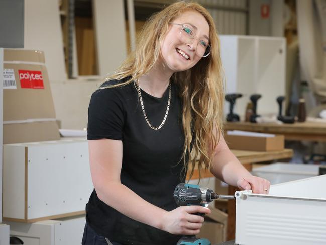 Adelaide-based carpenter Sarah Collier, currently working at DIY Flat-Pac Kitchens at Salisbury Plains, says she would welcome more infrastructure spending in SA in the budget and money to stimulate the housing market. Picture: Dean Martin