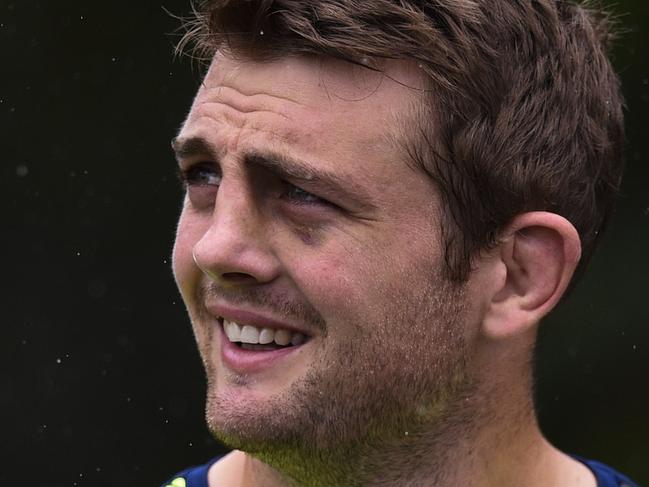 Australia's lock Dean Mumm attends an Australia team training session on September 21, 2015 at the University of Bath, south west England, ahead of their opening Rugby World Cup 2015 match against Fiji on Wednesday. AFP PHOTO / MARTIN BUREAU RESTRICTED TO EDITORIAL USE