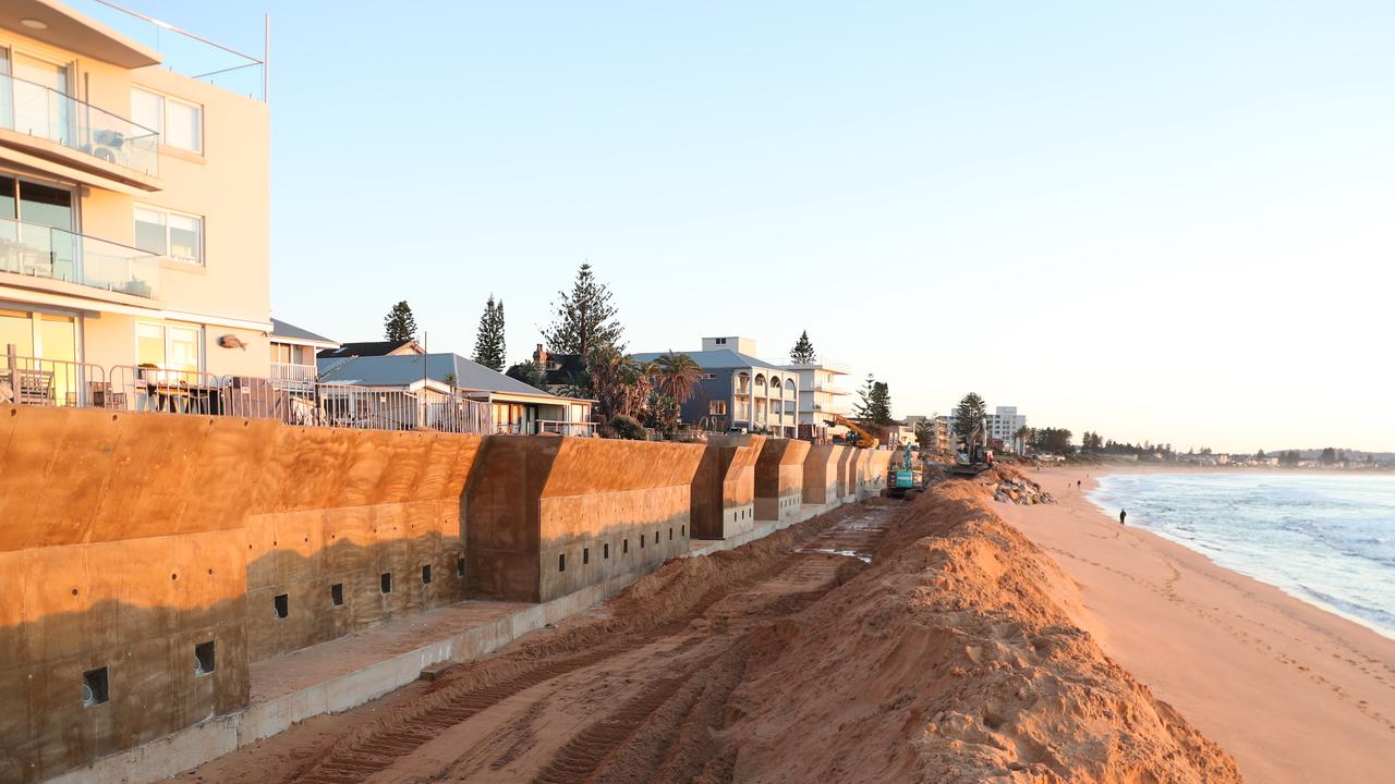 Work has begun on a section of 1.3km seawall to protect some beachfront properties in Collaroy and south Narrabeen. Picture: John Grainger