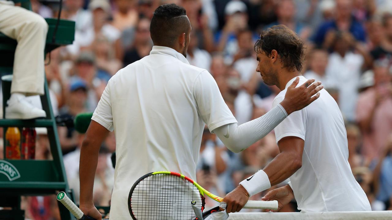 It was a fiery and aggressive match, but there was clear respect between Rafael Nadal and Nick Kyrgios after the contest. (Photo by Adrian DENNIS / AFP)