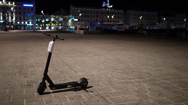 A scooter waits to be hired on the deserted Vieux Port in Marseille, France, on Sunday at the start of a night-time curfew. Picture: AFP