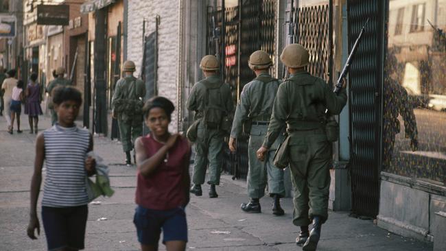 The National Guard patrol the streets in Chicago amid rioting and violence after the assassination of Martin Luther King, Jr in 1968. Picture: AP