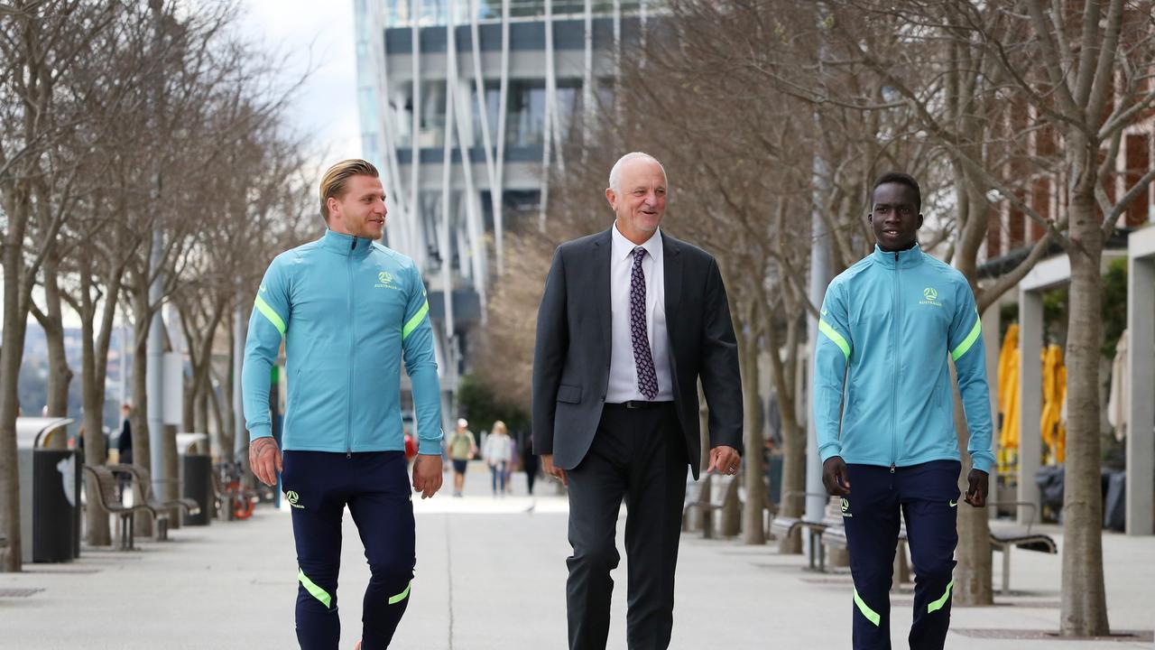 Socceroos coach Graham Arnold (centre) has put his World Cup faith in club teammates Jason Cummings (left) and Garang Kuol. Picture: Lisa Maree Williams/Getty Images