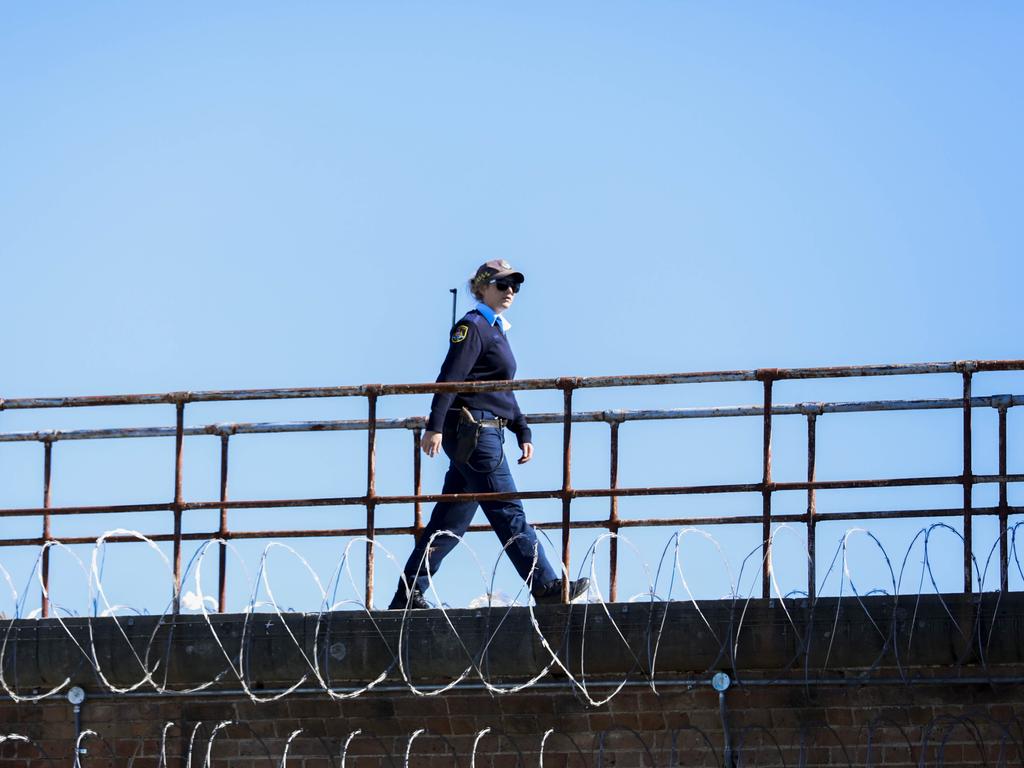 The newly refurbished High Risk Management Correctional Centre Area 2 is opened at Goulburn Jail, Goulburn, NSW. An armed guard on duty at the jail. Picture: Sean Davey