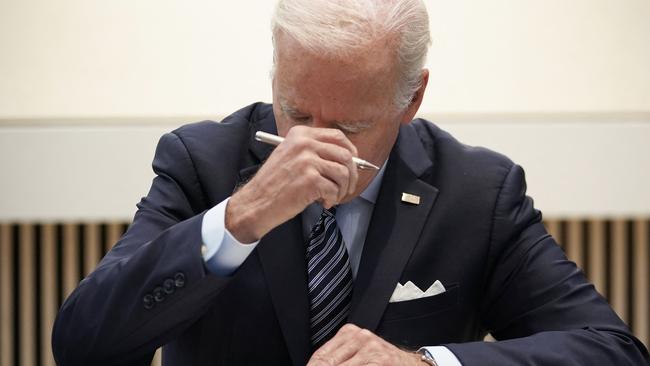 US President Joe Biden signs the condolence book for the Queen at the British Embassy in Washington. Picture: AFP