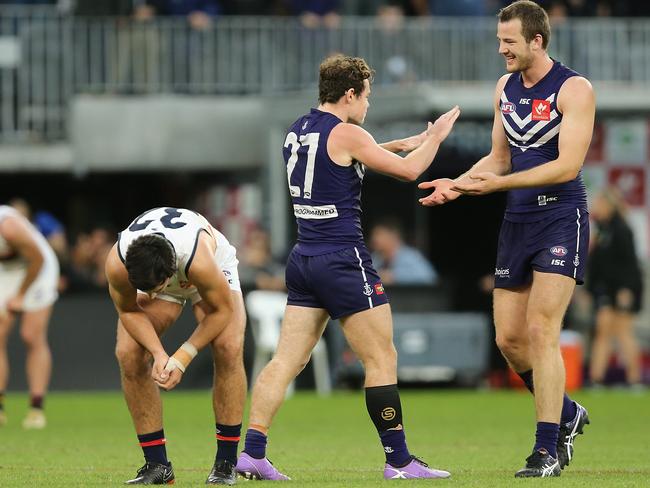 Michael Apeness, pictured celebrating a goal with Lachie Neale last year, has signed at North Ringwood. Picture: Paul Kane/Getty Images