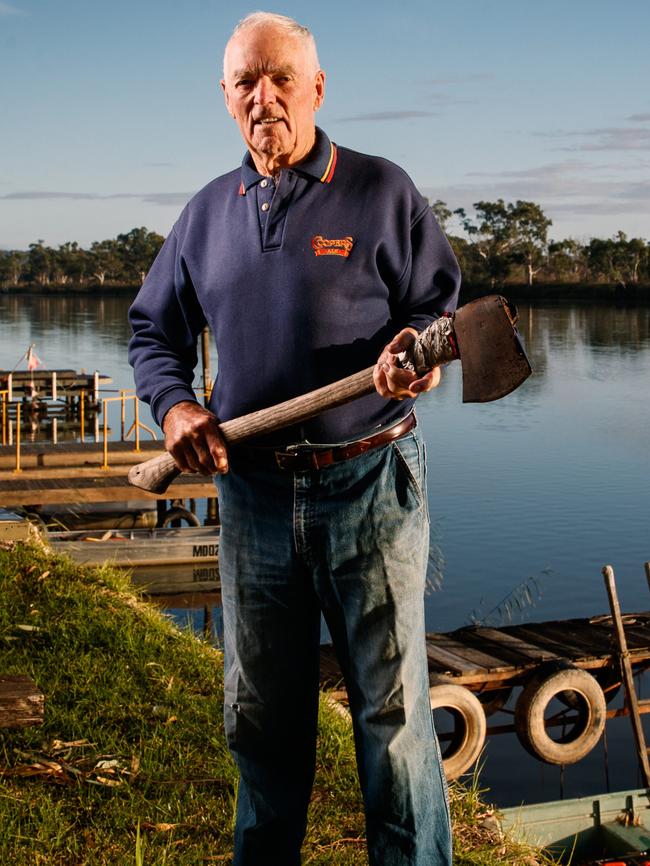 SANFL legend Neil Kerley with his axe at Walker Flat. Picture: Matt Turner.