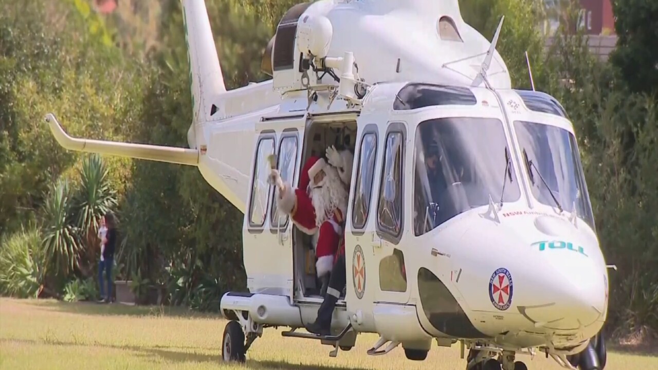 Santa makes an early visit to new hospice opening