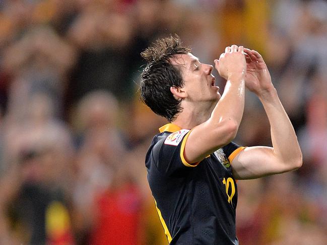 BRISBANE, AUSTRALIA - JANUARY 17: Robbie Kruse of Australia reacts after missing a shot at goal during the 2015 Asian Cup match between Australia and Korea Republic at Suncorp Stadium on January 17, 2015 in Brisbane, Australia. (Photo by Bradley Kanaris/Getty Images)