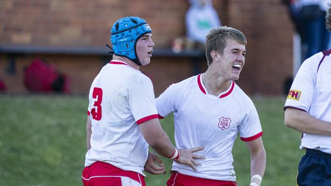 Marlon Frost celebrates his try for Ipswich Grammar School Picture: Kevin Farmer