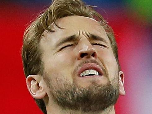 (FILES) In this file photo taken on January 13, 2019 Tottenham's English striker Harry Kane reacts after picking up an injury at the final whistle during the English Premier League football match between Tottenham Hotspur and Manchester United at Wembley Stadium in London. - Tottenham striker Harry Kane will be sidelined until March after suffering ankle ligament damage in Sunday's defeat against Manchester United. Kane sustained the injury to his left ankle in the closing moments of the 1-0 loss at Wembley and scans have now confirmed the extent of the problem. (Photo by Ian KINGTON / IKIMAGES / AFP) / RESTRICTED TO EDITORIAL USE. No use with unauthorized audio, video, data, fixture lists, club/league logos or 'live' services. Online in-match use limited to 45 images, no video emulation. No use in betting, games or single club/league/player publications.