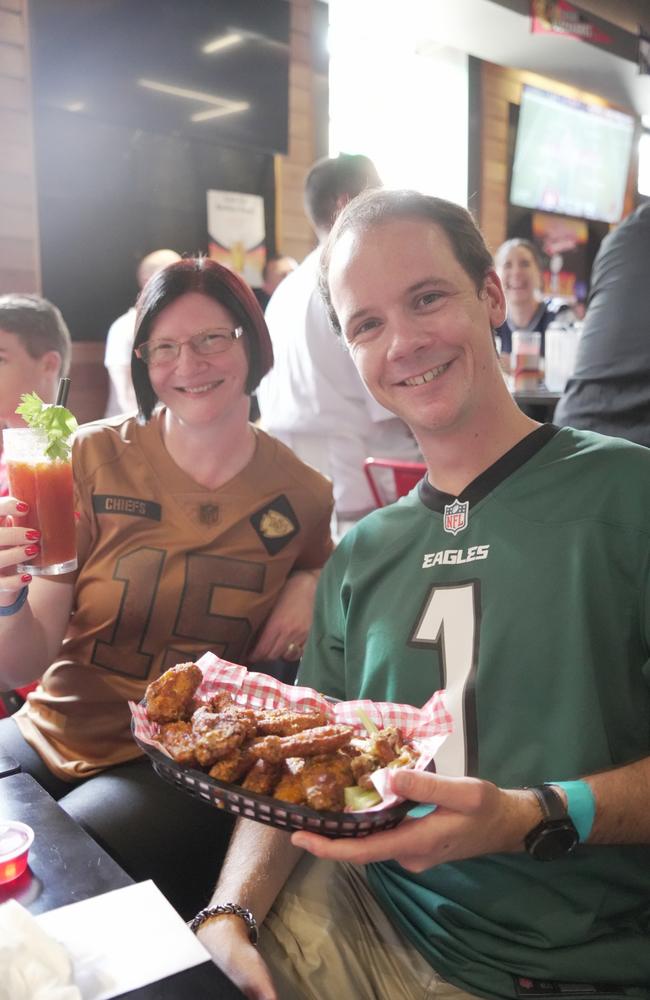 Enjoying the Super Bowl party at Tailgate Sports Bar in the Toowoomba CBD are Shay Scott and Peter Sanders.