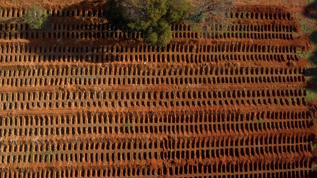 Graves on the outskirts of Sao Paulo in Brazil where authorities are struggling to cope with bodies. Picture: Fernando Marron / AFP