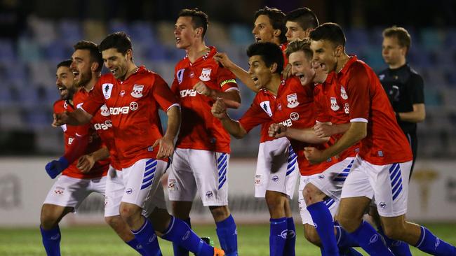 Sydney United celebrate winning a penalty shootout in the 2015 FFA Cup.