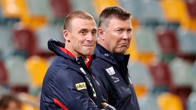 AFL Round 17. 12/09/2020. GWS Giants vs. Melbourne at the Gabba, Brisbane. Simon Goodwin, senior coach of the Demons and CEO Gary Pert. Pic: Michael Klein