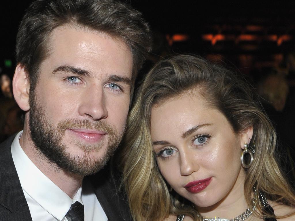 Liam Hemsworth (L) and Miley Cyrus. Picture: Getty