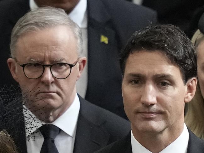 LONDON, ENGLAND - SEPTEMBER 19: Canada's Prime Minister Justin Trudeau, front right, and his wife Sophie, front left, walk with Australia's Prime Minister Anthony Albanese, center, left, as the coffin of Queen Elizabeth II is carried out of Westminster Abbey, after the State Funeral of Queen Elizabeth II at Westminster Abbey on September 19, 2022 in London, England.  Elizabeth Alexandra Mary Windsor was born in Bruton Street, Mayfair, London on 21 April 1926. She married Prince Philip in 1947 and ascended the throne of the United Kingdom and Commonwealth on 6 February 1952 after the death of her Father, King George VI. Queen Elizabeth II died at Balmoral Castle in Scotland on September 8, 2022, and is succeeded by her eldest son, King Charles III. (Photo by Frank Augstein - WPA Pool/Getty Images)