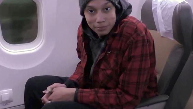 US basketball star Brittney Griner sitting on a plane after being released from the prison where she was detained. Picture: Russian State Media / AFP