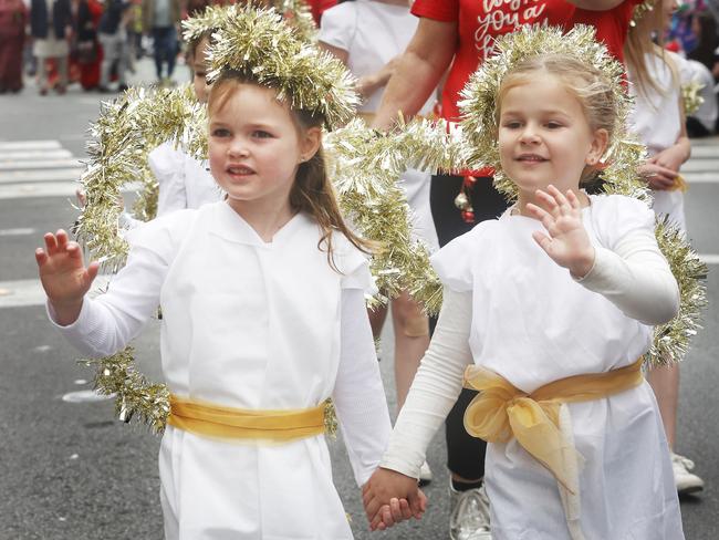 Heidi Gilroy 5 and Delilah Morrison 5 who were part of the Holy Rosary Catholic School float.  City of Hobart Christmas Pageant 2023.  Picture: Nikki Davis-Jones