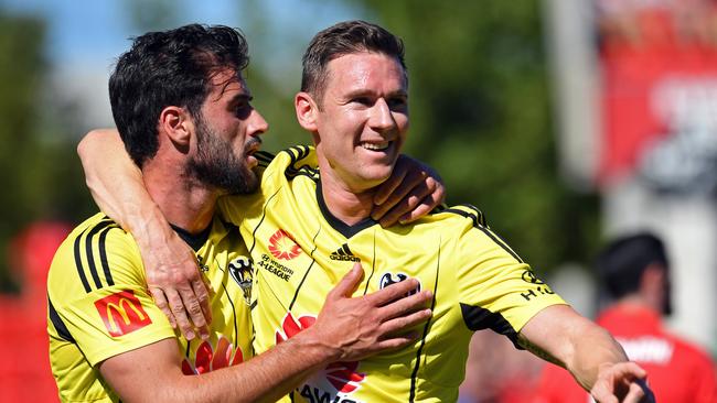 29/01/17 - A League: Adelaide United v Wellington Phoenix at Cooper's Stadium. Wellington's Thomas Doyle celebrates with teammate Shane Smeltz after scoring a goal. Picture: Tom Huntley