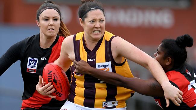 Hawthorn’s Jessica Sibley breaks a tackle against Essendon on Saturday Picture: Andy Brownbill