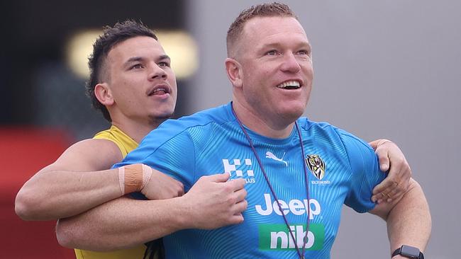 Daniel Rioli tries to wrestle with assistant coach Justin Leppitsch at Richmond training earlier in the season. Picture: Michael Klein