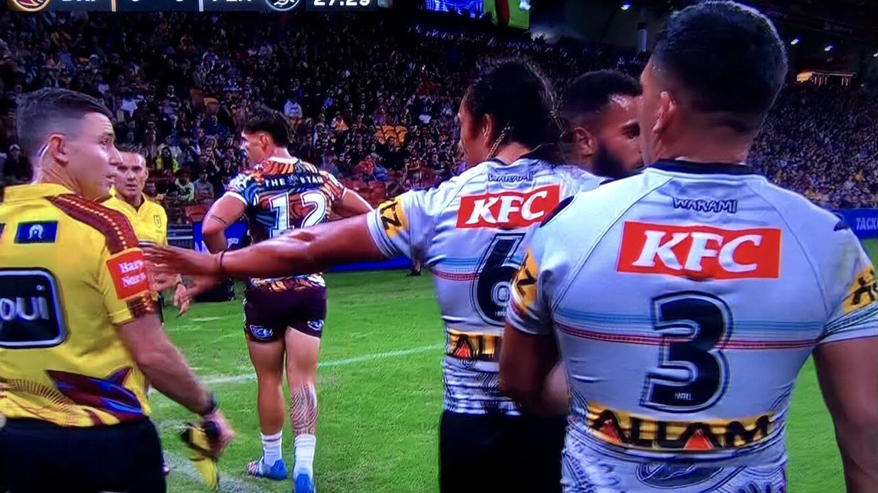 Jarome Luai apologies after appearing to shove touch judge Chris Sutton.