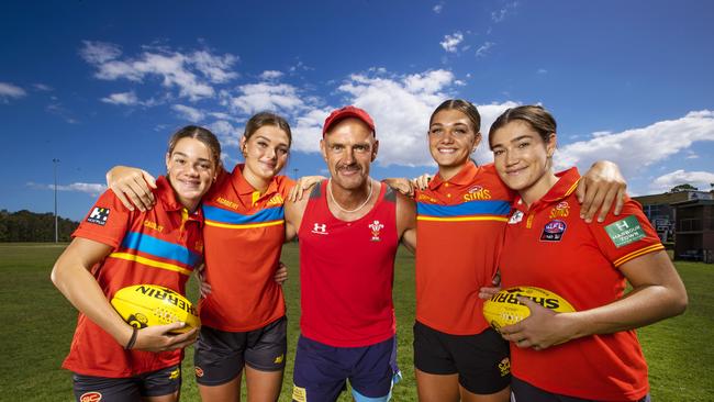 Darren Davies with his girls Georja, Fleur, Darcie and Giselle. Picture: NIGEL HALLETT