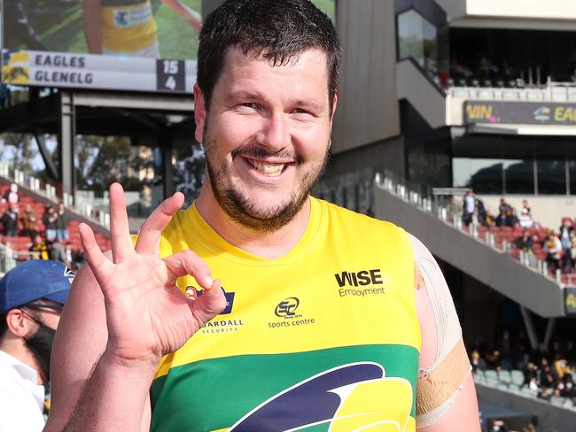 Jarrad Redden of the Eagles with three fingers up for his three SANFL premierships Picture: Sarah Reed