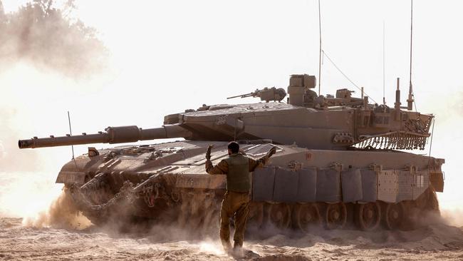 Israeli armour on the border with Gaza in southern Israel on Sunday. Picture: AFP