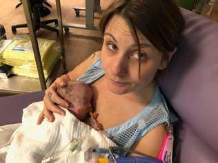 Krista Jarvis with her young bub Malakai. The two are still in hospital. Ms Jarvis' home was destroyed by fire at the weekend.