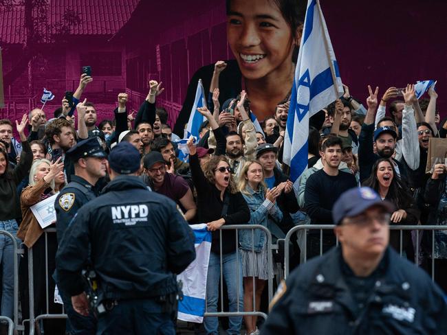 People cheer in support of Israel during protests near the Israeli Consulate in New York City. Picture: Getty Images via AFP