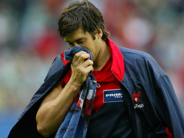 Jeff White holds his face after being kicked by Steven King. Melbourne v Geelong. MCG. 2nd Elimination Final.