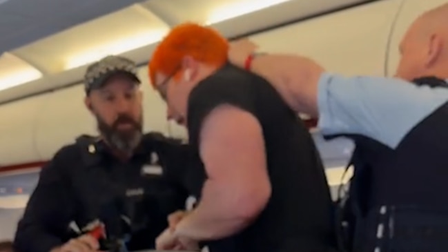 Dramatic moment man removed from Jetstar flight