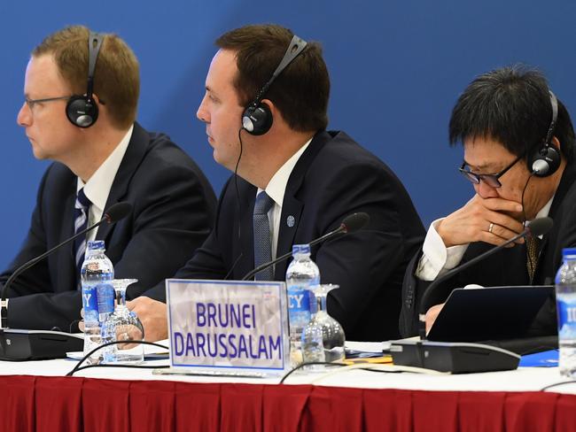 Australia's Minister for Trade, Tourism and Investment Steven Ciobo (centre) attends an APEC meeting in Vietnam. Picture: AFP/Nam Hoang Dinh