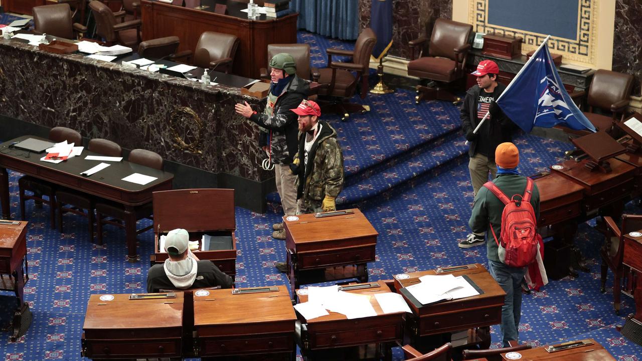 MAGA supporters enter the Senate Chamber. Picture: Win McNamee/Getty Images/AFP