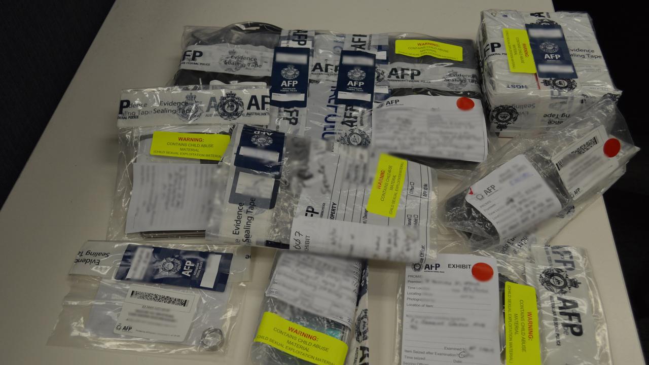 Devices seized in the arrest of Wyong man Justin Radford, 29, in February 2020 as part of an Australian Federal Police investigation into online sharing of child sex abuse material. Picture: AFP