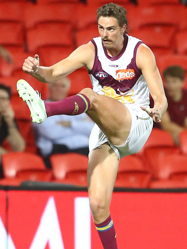 New Lion Joe Daniher kicks for goal during a pre-season game. Picture: Getty