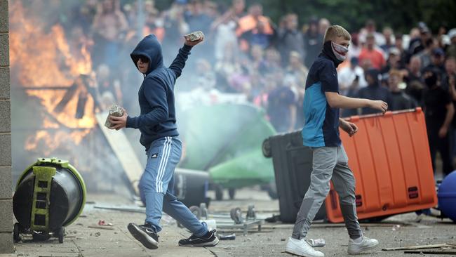 Anti-migration rioters outside the Holiday Inn Express in Rotherham, which is being used as an asylum hotel. Picture: Christopher Furlong/Getty Images