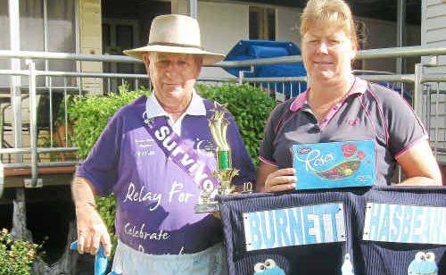 Ray Hutchinson wears the outfit he wore at the Maryborough Relay for Life last weekend. Michelle Bechley made the comical trousers, and the pair display the trophy won for the best-dressed team at the event. Picture: Submitted